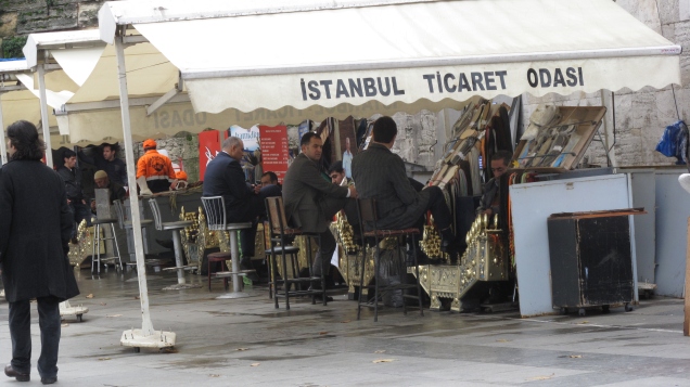 Turkish Businessmen stopping for shoeshine